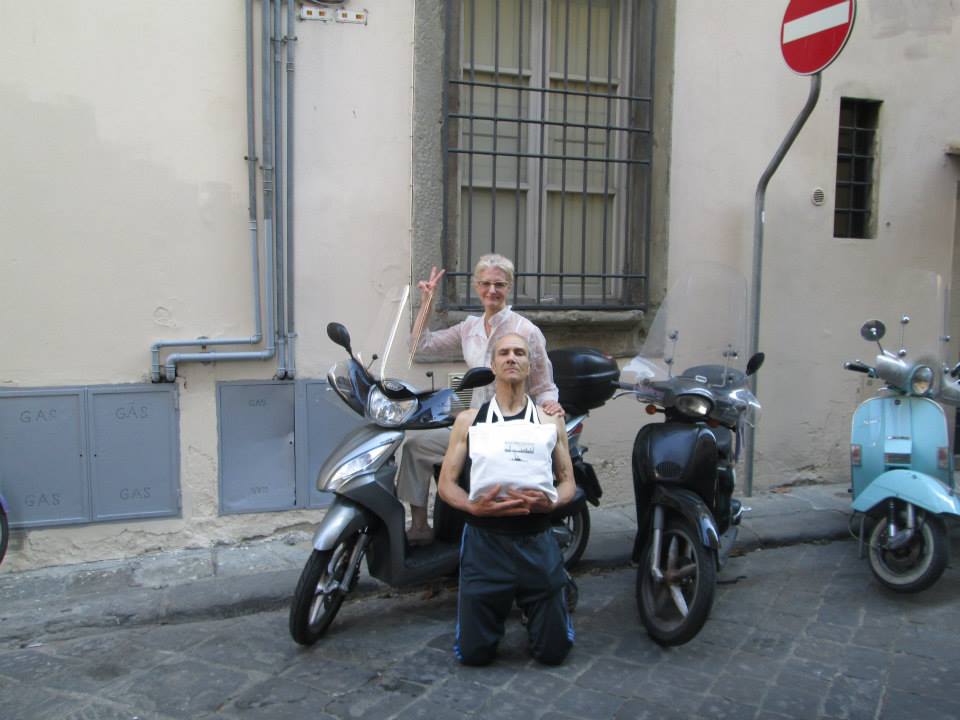a man and a woman with motorbikes
