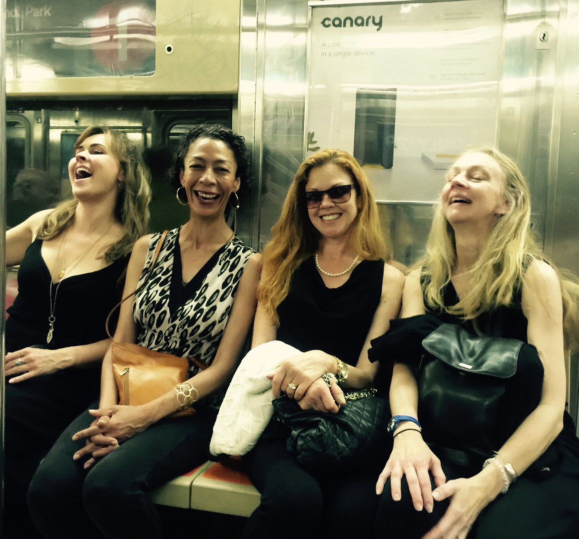 four women inside a train
