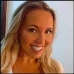 Smiling woman with long blonde hair.